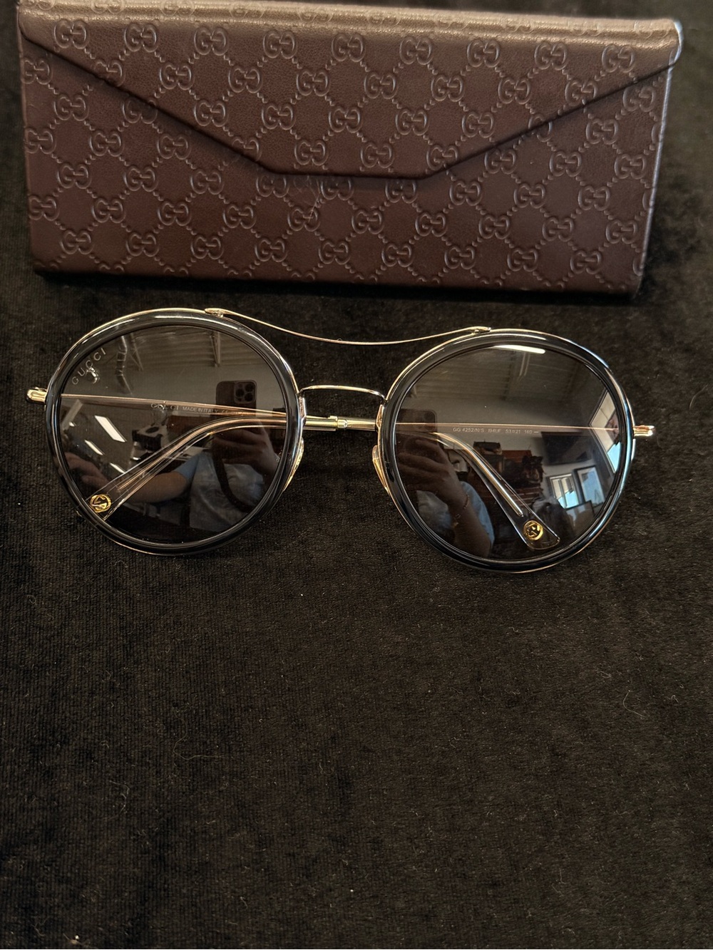 Gucci Black and Gold Round Frame Sunglasses